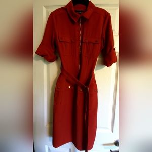 Reddish-orange belted, zip front mini dress